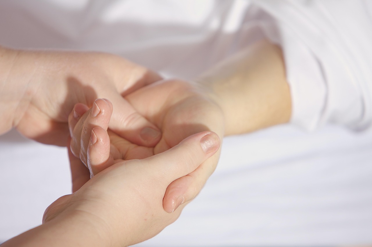 Massage or spa treatment being performed in a day spa treatment room