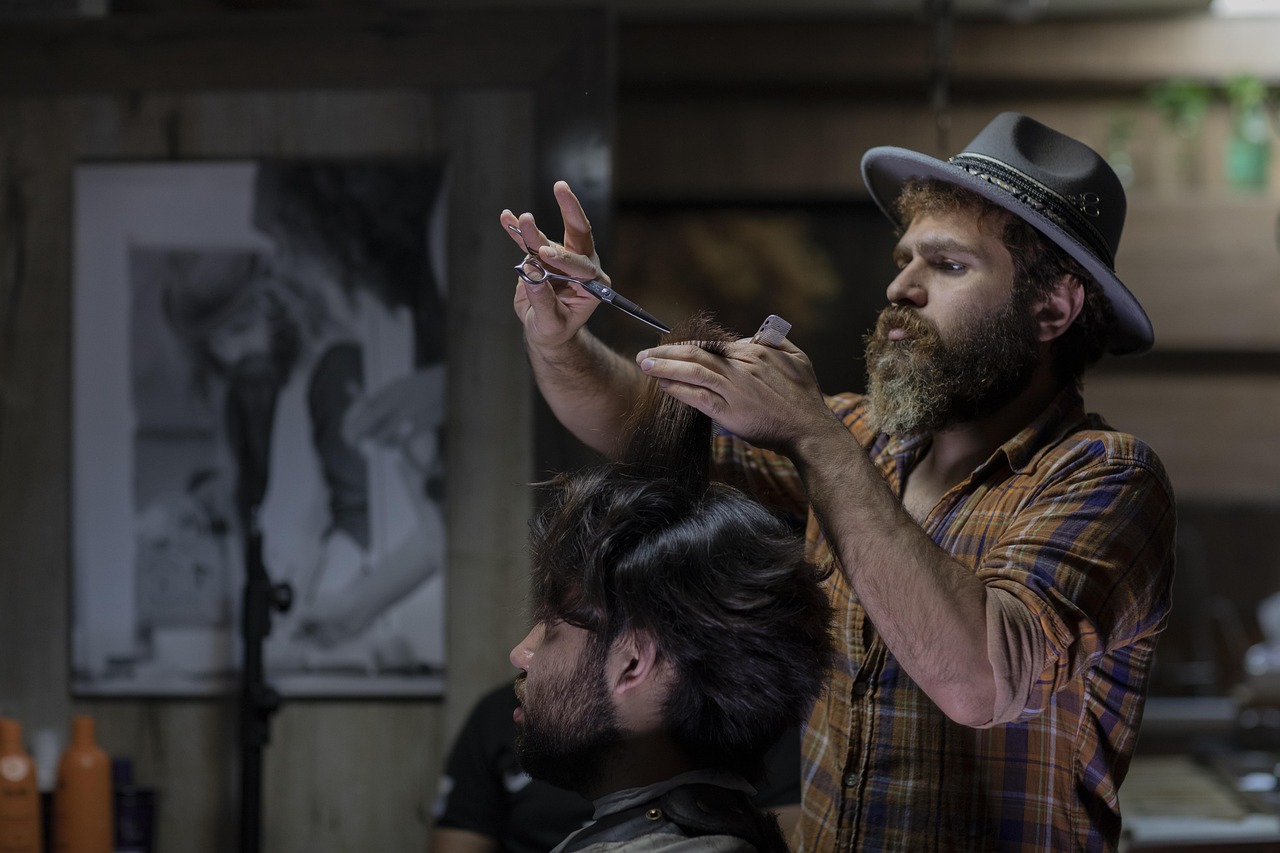 Barber cutting a client's hair in a barber shop