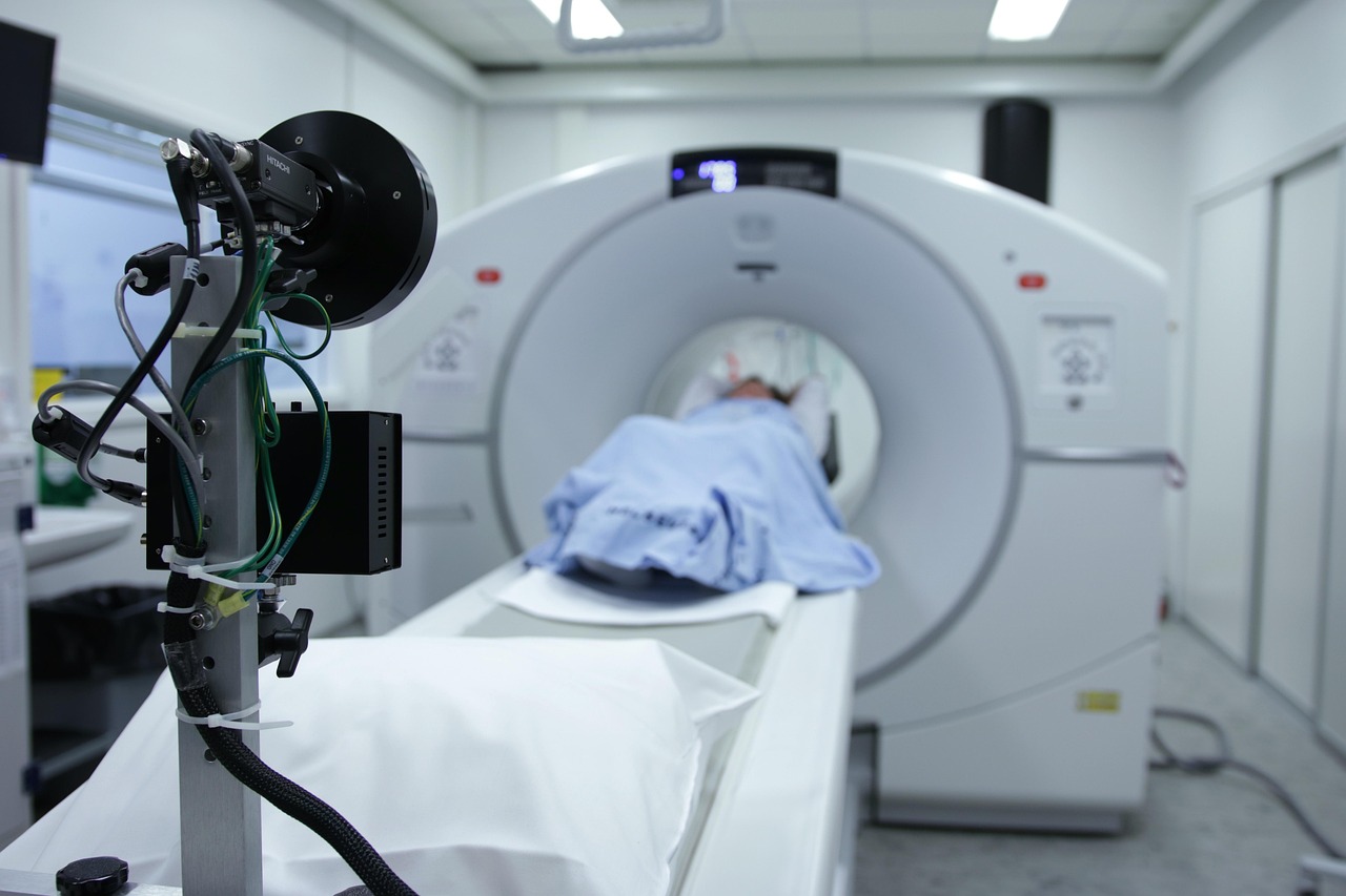 Diagnostic imaging technician operating medical imaging equipment