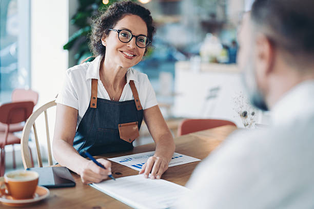 Restaurant owner reviewing lease and certificate of insurance requirements