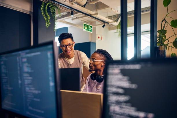 Software development team collaborating in a technology office
