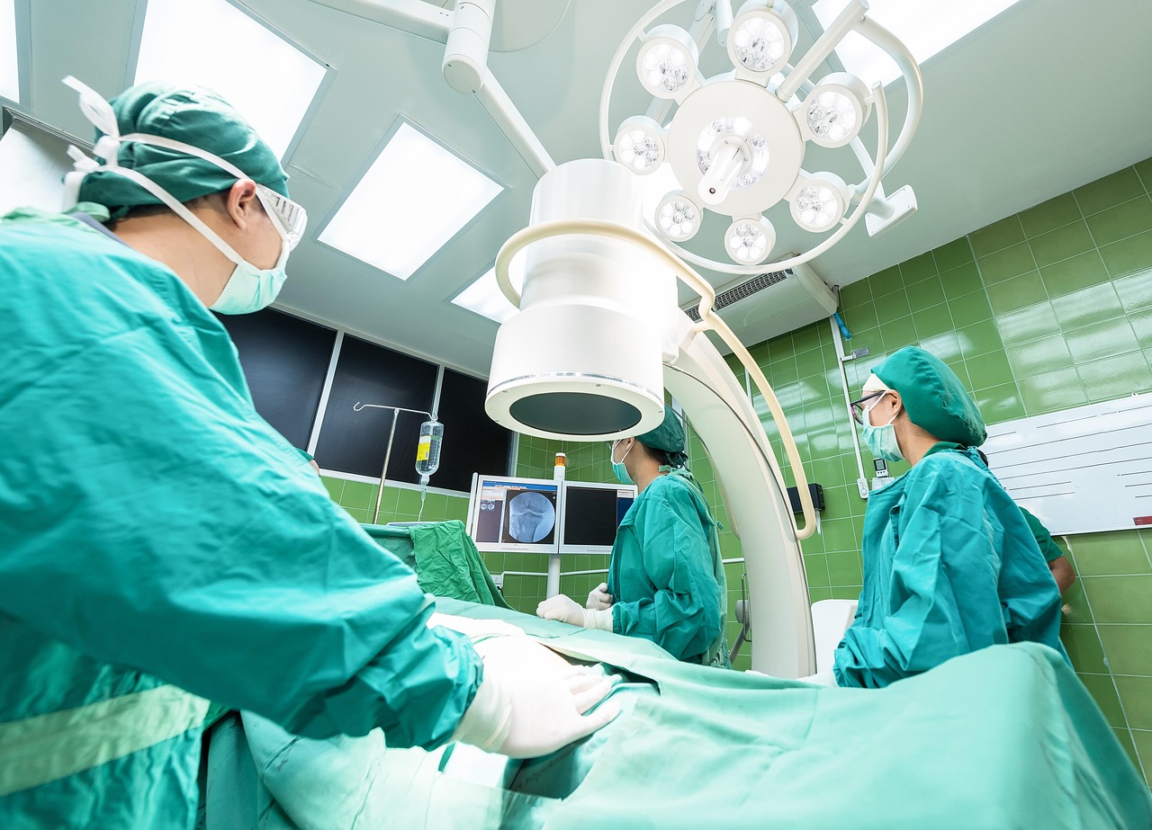 Veterinary surgical team performing a procedure in an animal hospital operating room