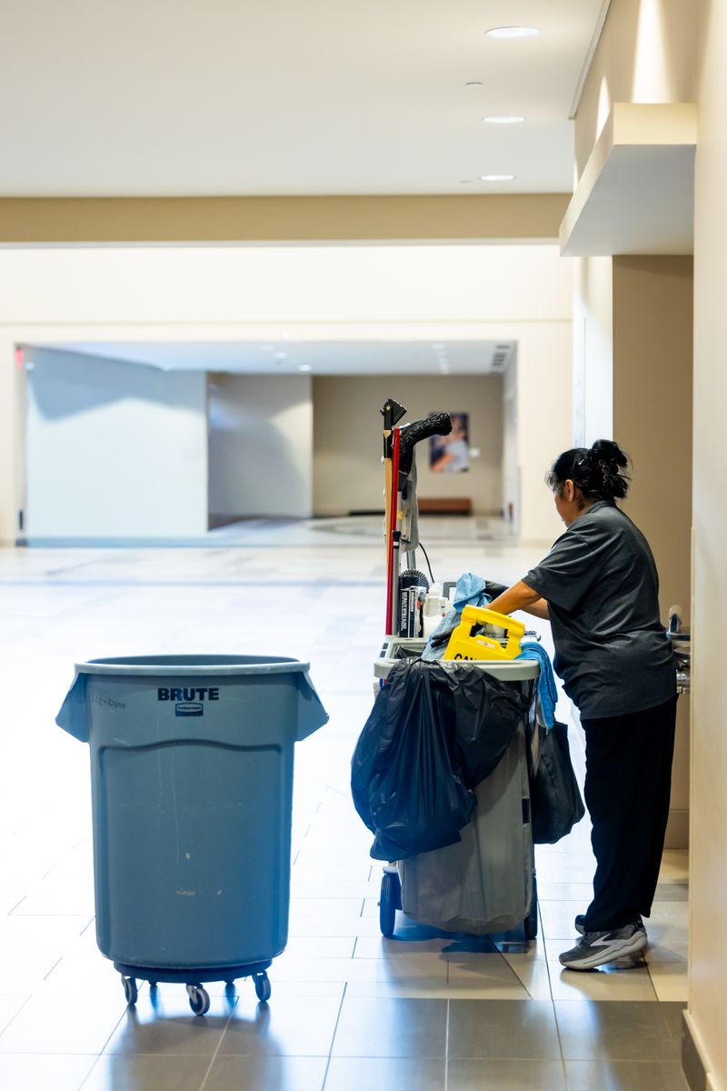 Janitorial worker providing commercial cleaning service