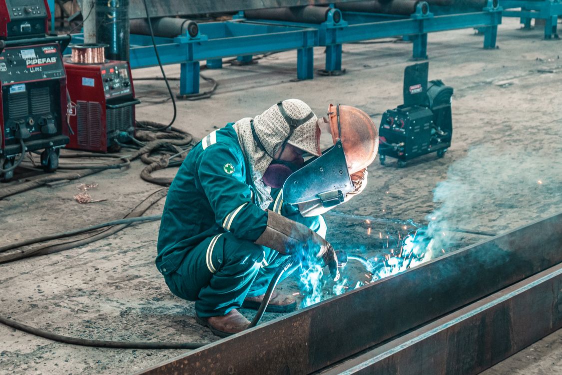 Metal fabricator working in a machine shop