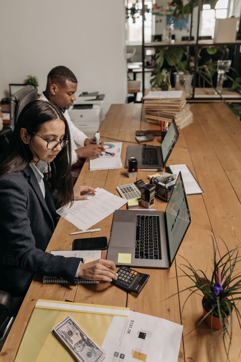 Financial advisor reviewing paperwork with a client